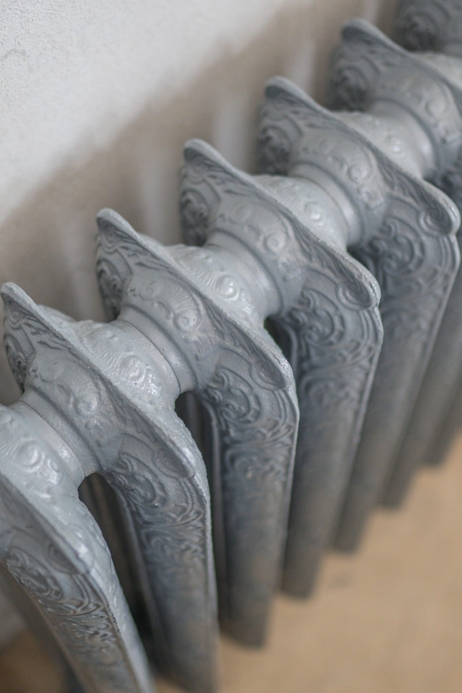 Ornate vintage cast iron radiator close-up